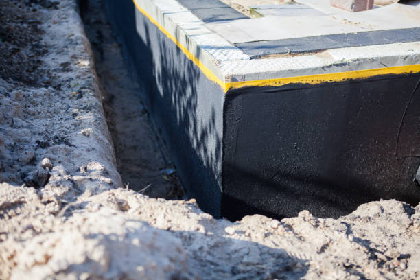Professional Waterproofing technician working in Pedricktown, NJ